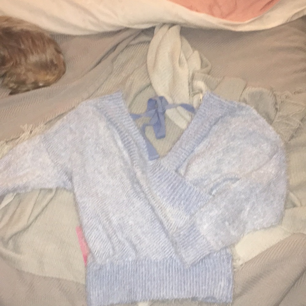 Blue fuzzy sweater with open back
